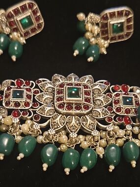 Gold-Tone Floral Necklace with Green Beads and Red Stone Accents